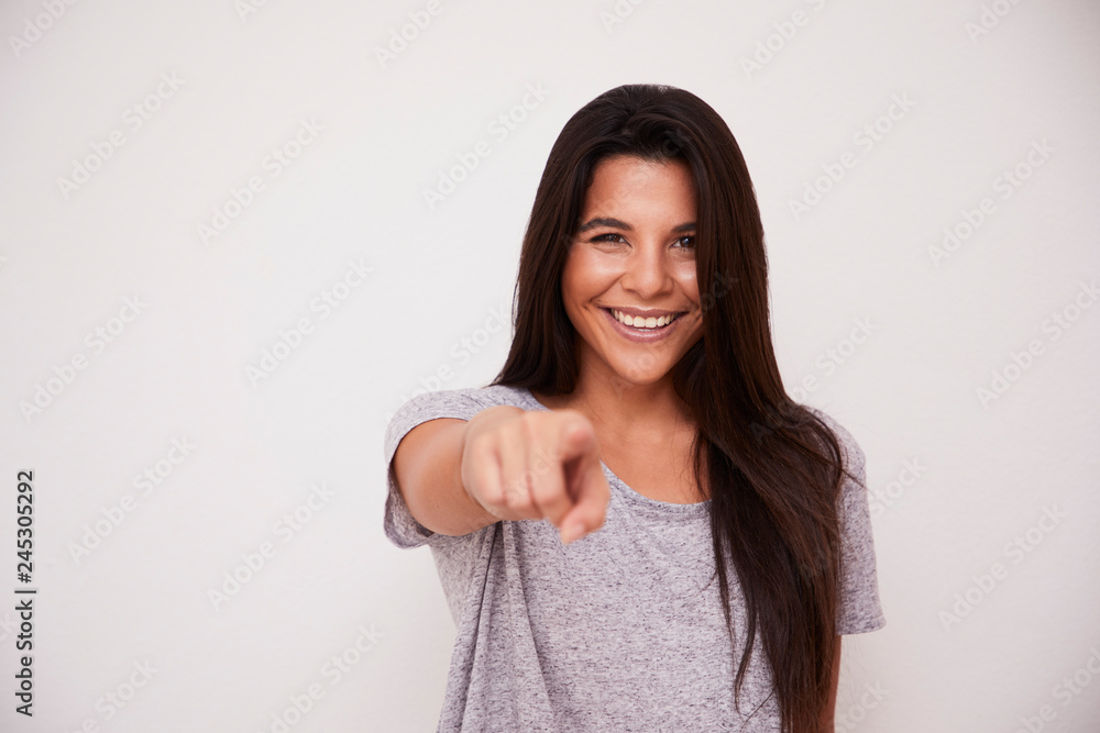 Gorgeous brunette point to camera, smiling Gorgeous brunette point to camera, smiling