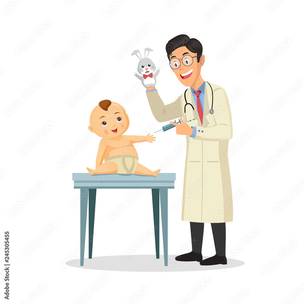 Young doctor pediatrician performs a vaccination of a little boy. The doctor is holding a toy.