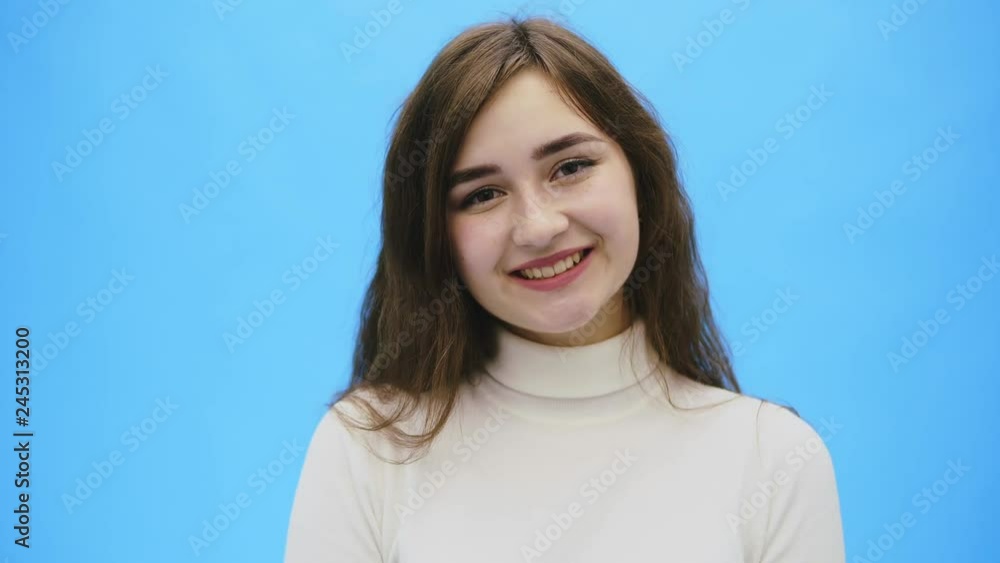 Beautiful young woman with clean, perfect skin. Portrait of beauty model with natural make-up and a smile. Beautiful young woman with clean, perfect skin. Portrait of beauty model with natural make-up and a smile.