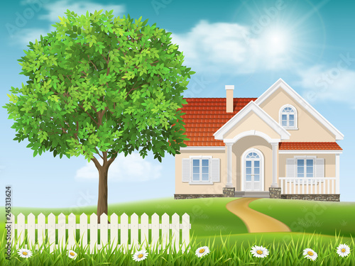 House on a hill and tree Spring country landscape. Grass and tree on the foreground.
