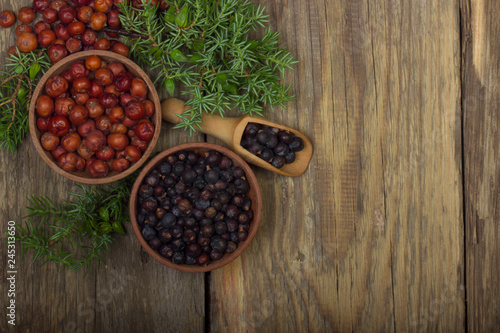 heap of red and black juniper berries background