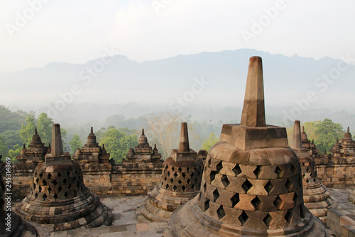 Borobudur Temple with the mysteries forest surrounding during sunrise, Yogyakarta, Indonesia