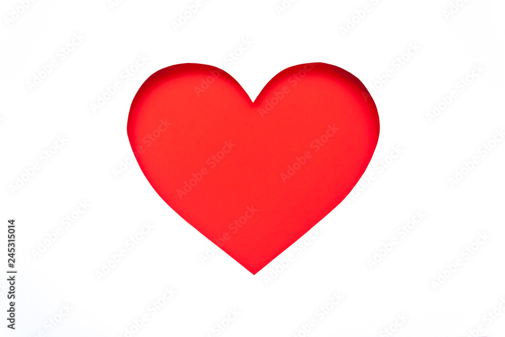 Heart from red paper on white background.