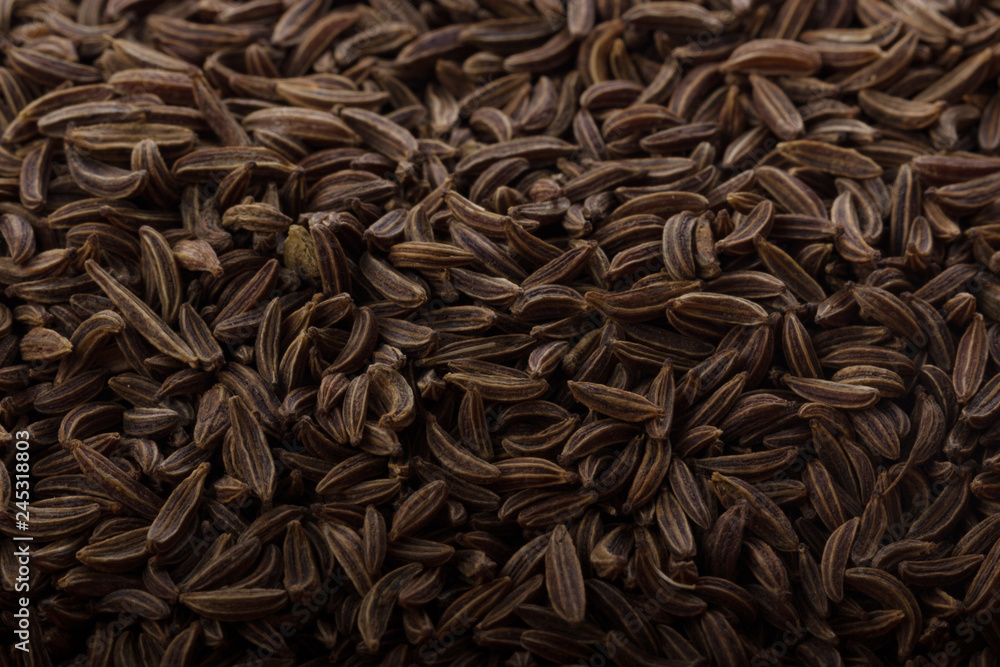 heap of cumin (caraway) background heap of cumin (caraway) background