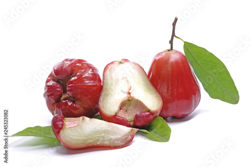 Rose apple or Bell fruit with green leaves isolated on white background.