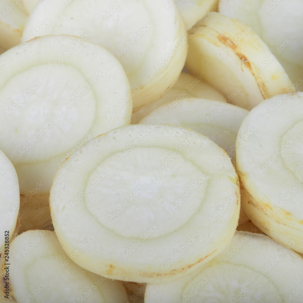 heap of slices of parsley root background heap of slices of parsley root background