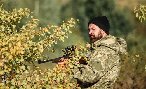 Man hunter with rifle gun. Boot camp. Military uniform fashion. Bearded man hunter. Army forces. Camouflage. Hunting skills and weapon equipment. How turn hunting into hobby. fight for freedom