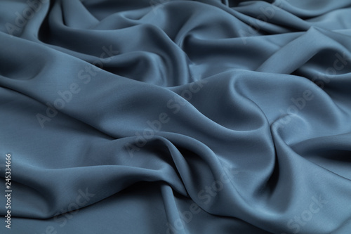  Blue Fabric for a decor and an interior is put by decorative spiral folds