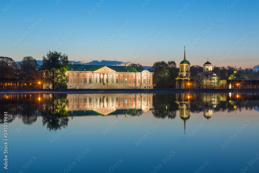 Beautiful Kuskovo Palace reflected in the pond at sunrise, Moscow