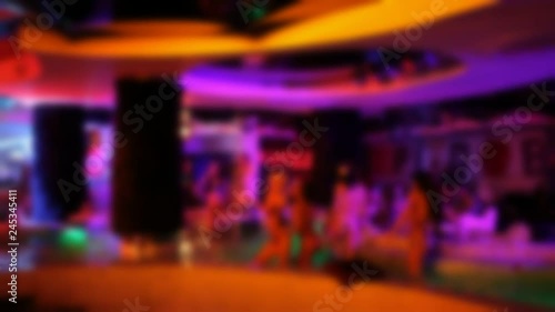 Beautiful sexy girls dancing in night club in lingerie..Out of focus