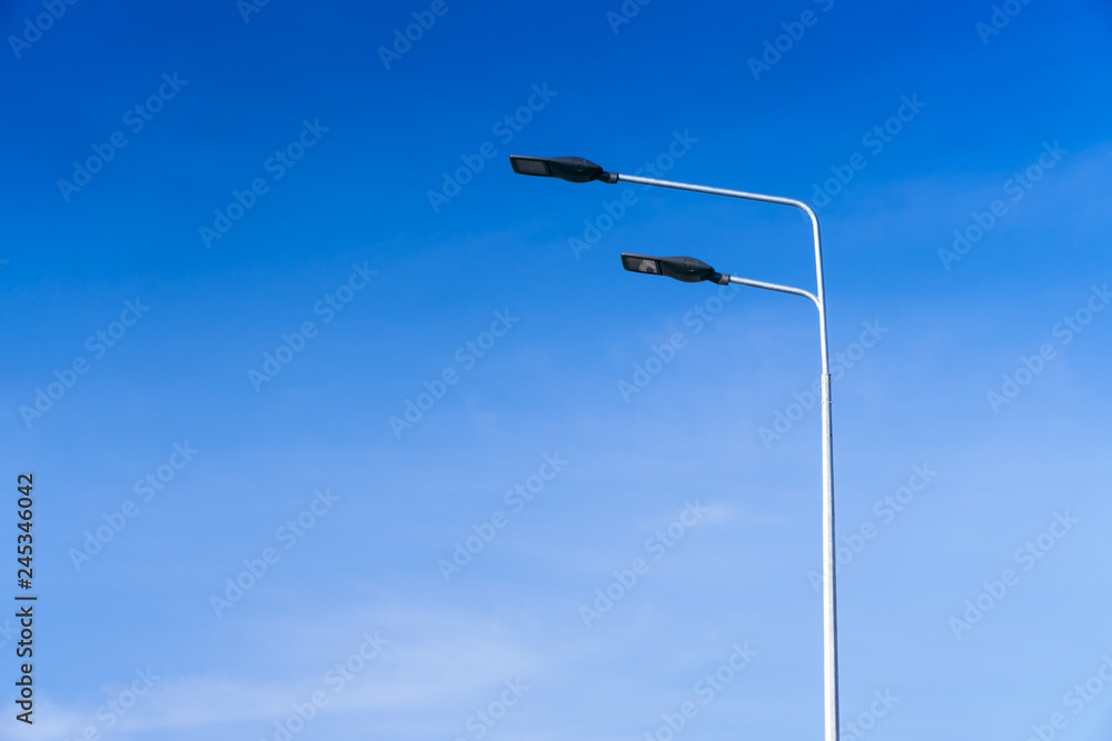 street lighting, supports for ceilings with led lamps. concept of modernization and maintenance of lamps, place for text, day street lighting, supports for ceilings with led lamps. concept of modernization and maintenance of lamps, place for text, day