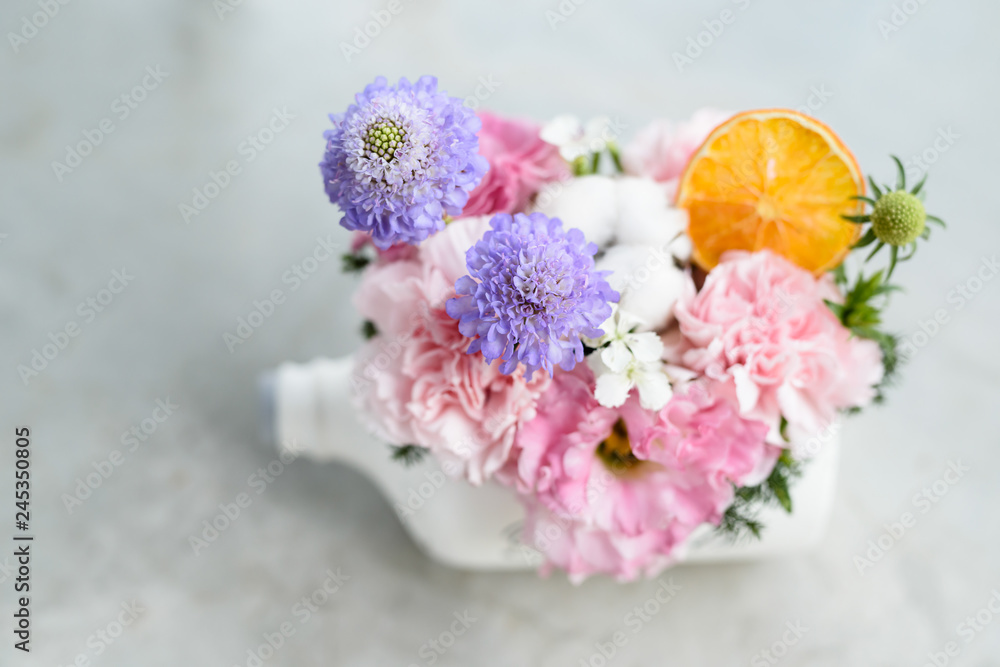 beautiful flowers in white bottle pot beautiful flowers in white bottle pot