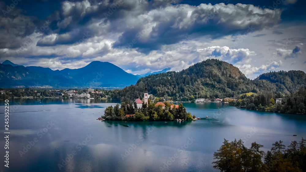 Aerial view of Bled lake near the Bled town in Slovenia. National park Triglav, part of Alps mountains called Julian Alps.