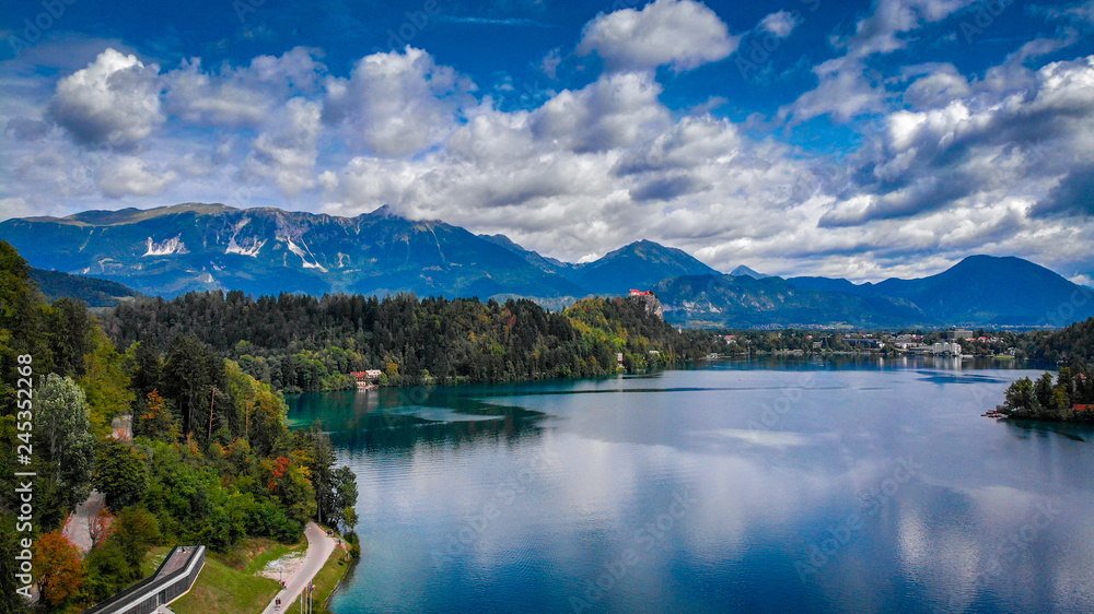 Obraz premium Aerial view of Bled lake near the Bled town in Slovenia. National park Triglav, part of Alps mountains called Julian Alps.