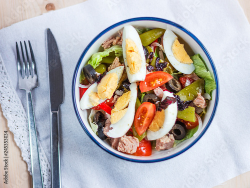 Nicoise salad with tuna, green beans, basil and fresh vegetables