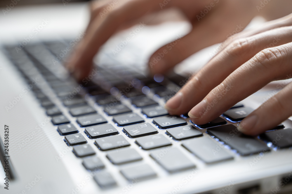 Woman working on laptop at home Woman working on laptop at home