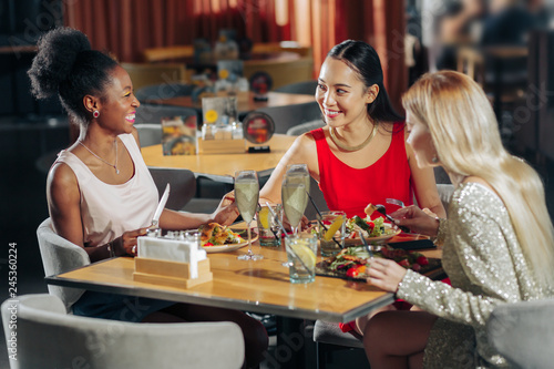 Woman laughing while spending evening with friends