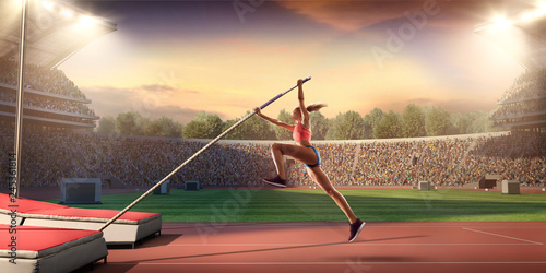 Fototapeta Młoda kobieta sportowiec skoku o tyczce z drążkiem. Kobiety w strojach sportowych na torze sportowym w profesjonalnym stadionie