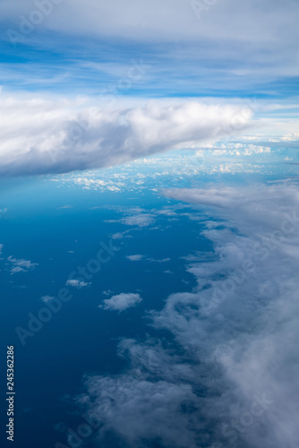 cloud above sky, trangle shape cloud on sky. © happystock