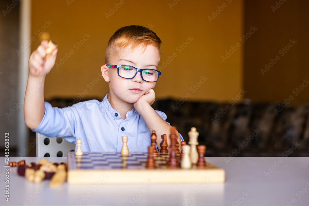 Little Clever Boy Playing Chess Online Stock Photo - Image of monitor,  home: 62046156