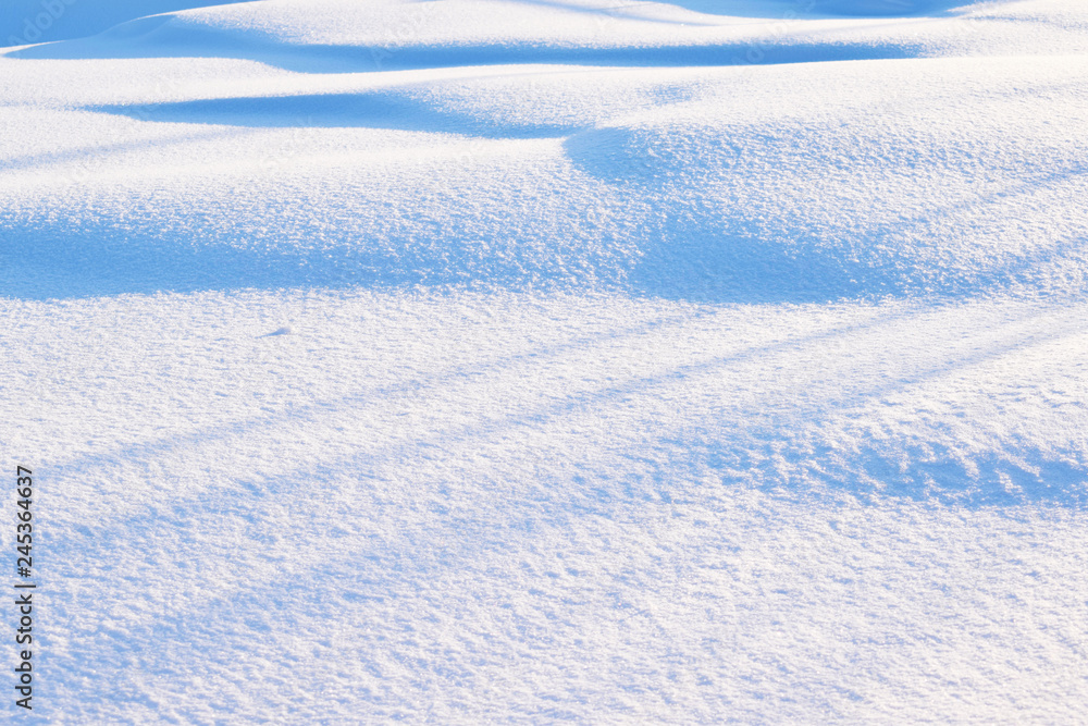 A cold winter day.Drawing on snow.Snowdrift.Abstract background.