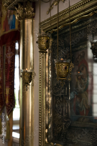 Church lamps and icons in the temple