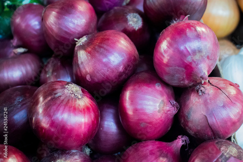 Bunch of red onions on a pile