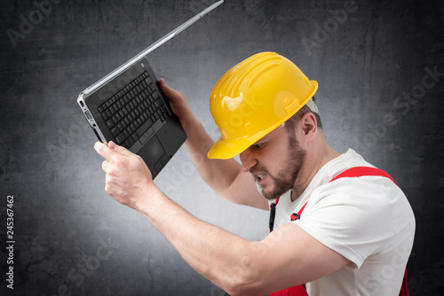 Construction worker with laptop