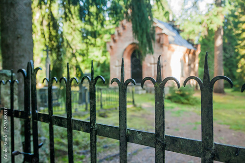 Black fence at old chapel at Wrede family cemetery. 18 September 2018 - Anjala, Kouvola, Finland.