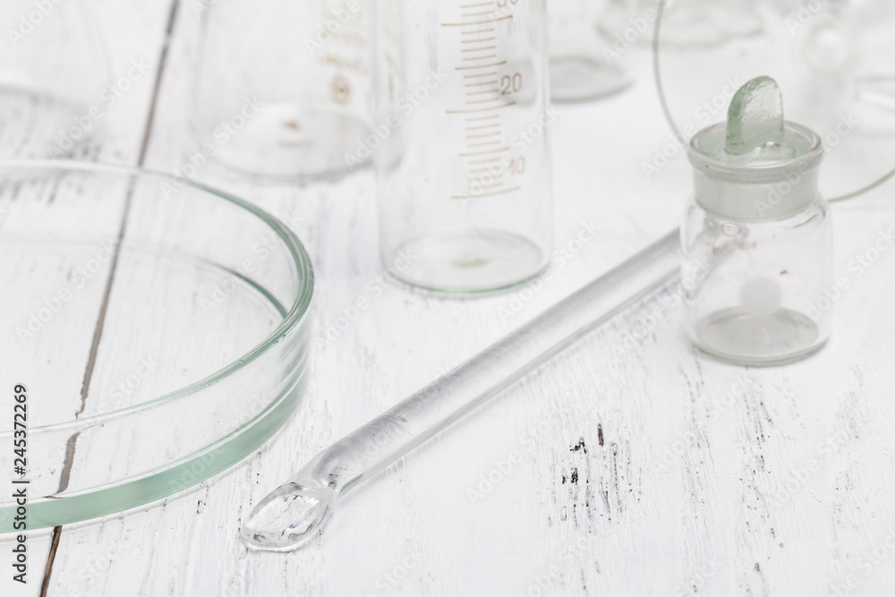 equipment of chemical laboratory on wooden table equipment of chemical laboratory on wooden table