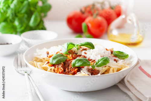 spaghetti bolognese with basil and parmesan, italian pasta