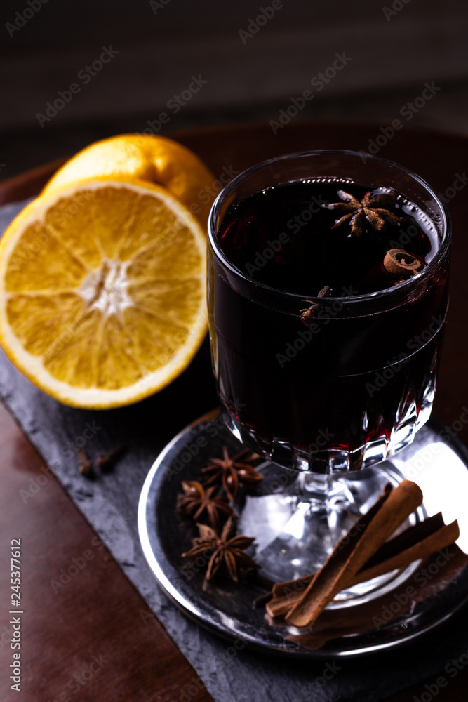 Glasses of delicious mulled wine on color table Glasses of delicious mulled wine on color table