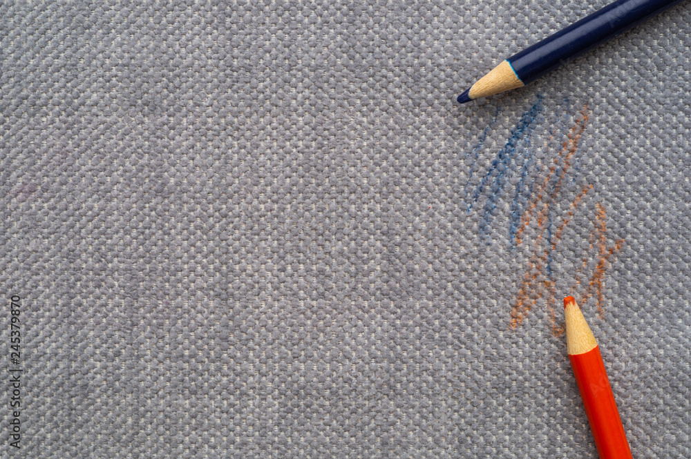 Drawn fabric on the couch with colored pencils. Furniture fabric. Cleaning concept Drawn fabric on the couch with colored pencils. Furniture fabric. Cleaning concept