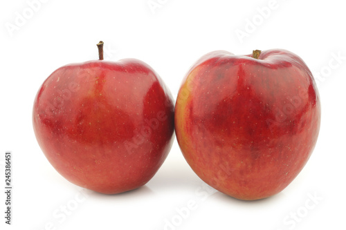 Fresh apples called "red love" on a white background