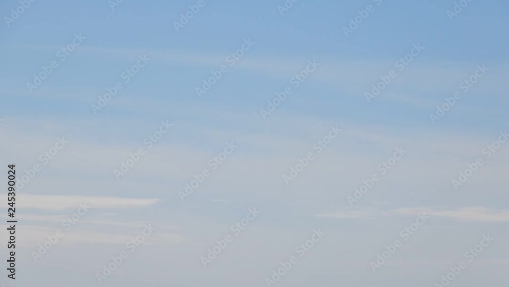 White Cloudy Sky With Jet Streaking Right To Left White Cloudy Sky With Jet Streaking Right To Left