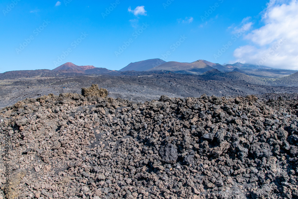 Edge of the volcanic lava field with Teneguia volcano in the background La Palma Island, Canaries, Spain