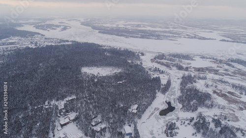 Frozen river and forest in snow view Fromm 500 meter , drone shoot ,areal photo  photo