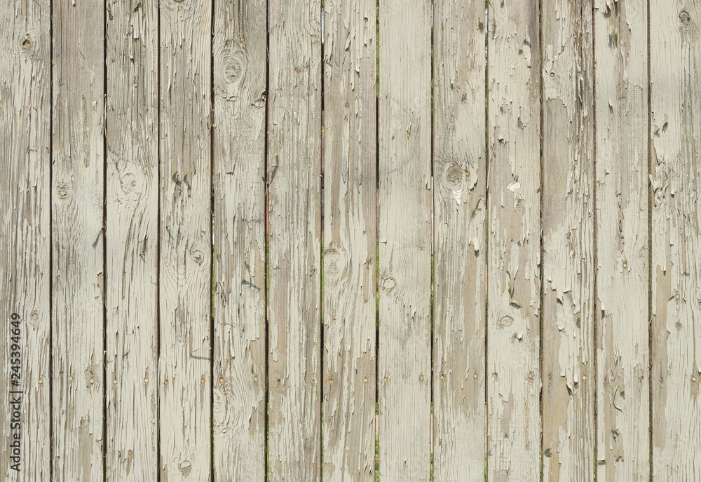 Fototapeta premium Wooden background with peeling white paint