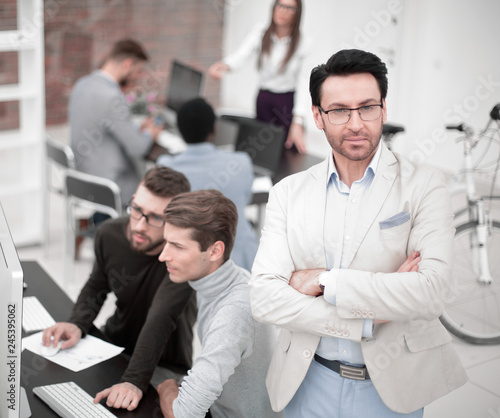 confident businessman on the background of the office.