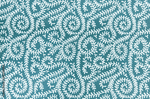 Background texture of white vines on cool blue