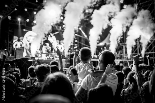 Concert crowds with adults and children black and white version