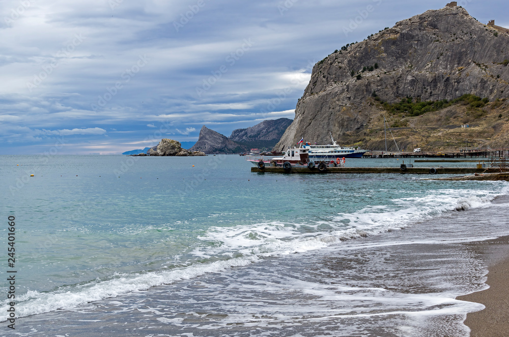Fototapeta premium Black Sea Cove on a cloudy day.