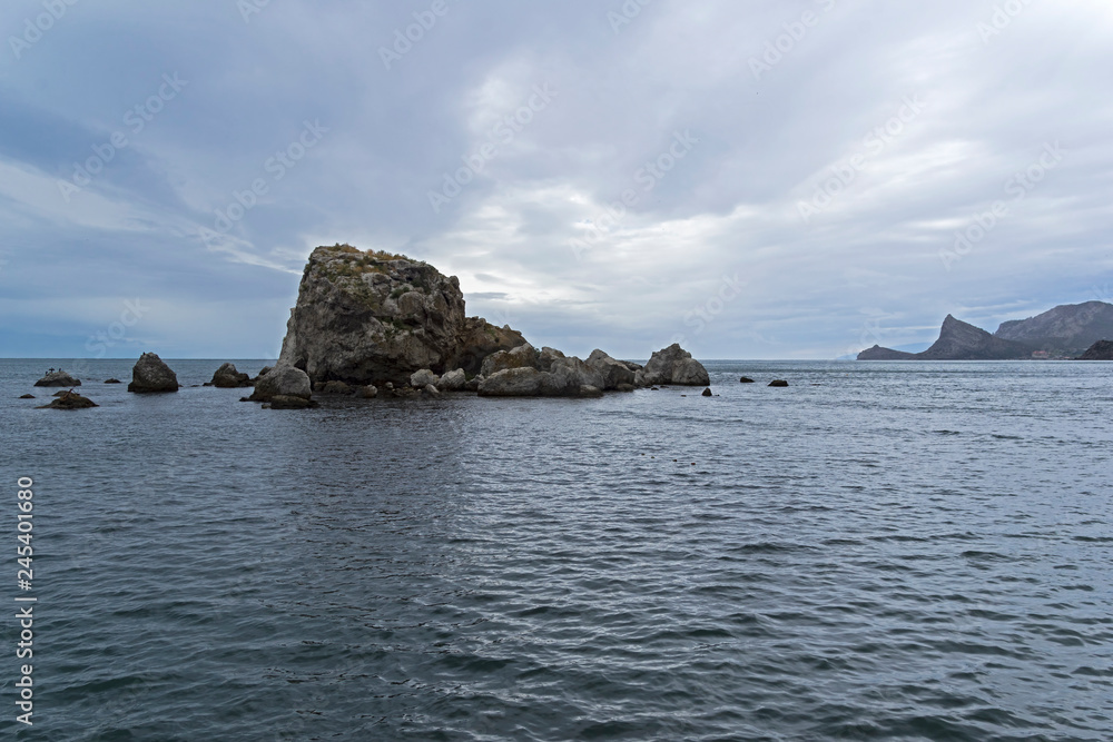 A small rocky island.