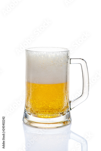 Beer in glass on a white background.