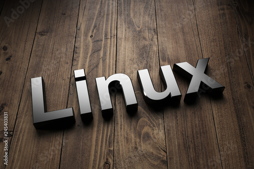 Linux sign highlighted on a wooden panel