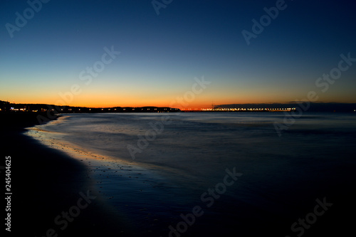 Beach and marina at sunset, long-exposure, Poland