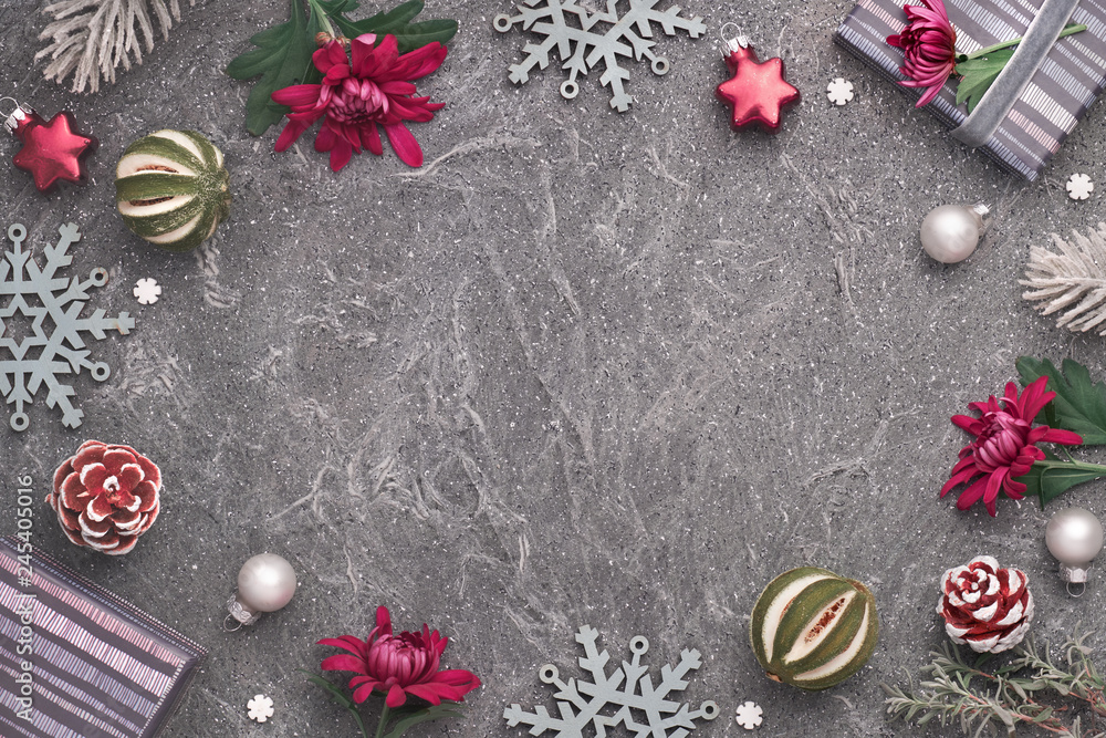 Burgundy chrysanthemum flowers on textured background with winter decorations, copy-space Burgundy chrysanthemum flowers on textured background with winter decorations, copy-space