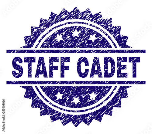 STAFF CADET stamp seal watermark with distress style. Blue vector rubber print of STAFF CADET text with dirty texture.