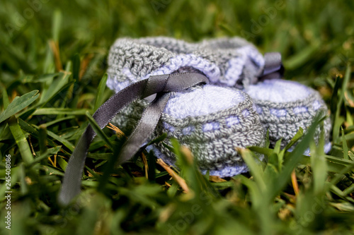 baby´s shoes on the grass