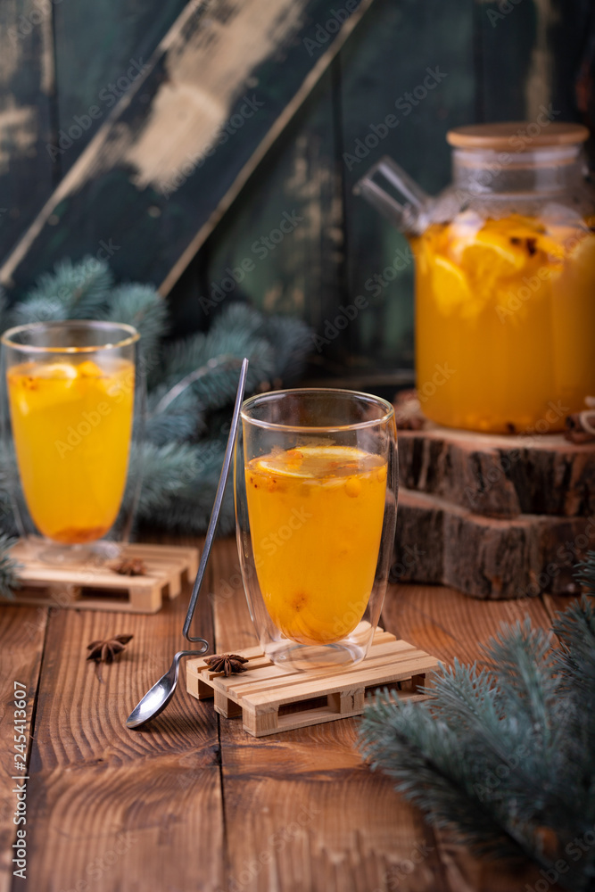 glass of orange juice and oranges on wooden table glass of orange juice and oranges on wooden table
